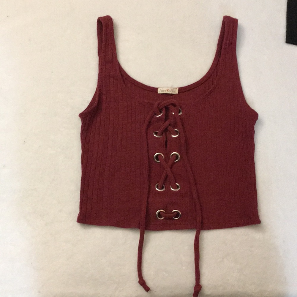Maroon semi crop tank top with detail.